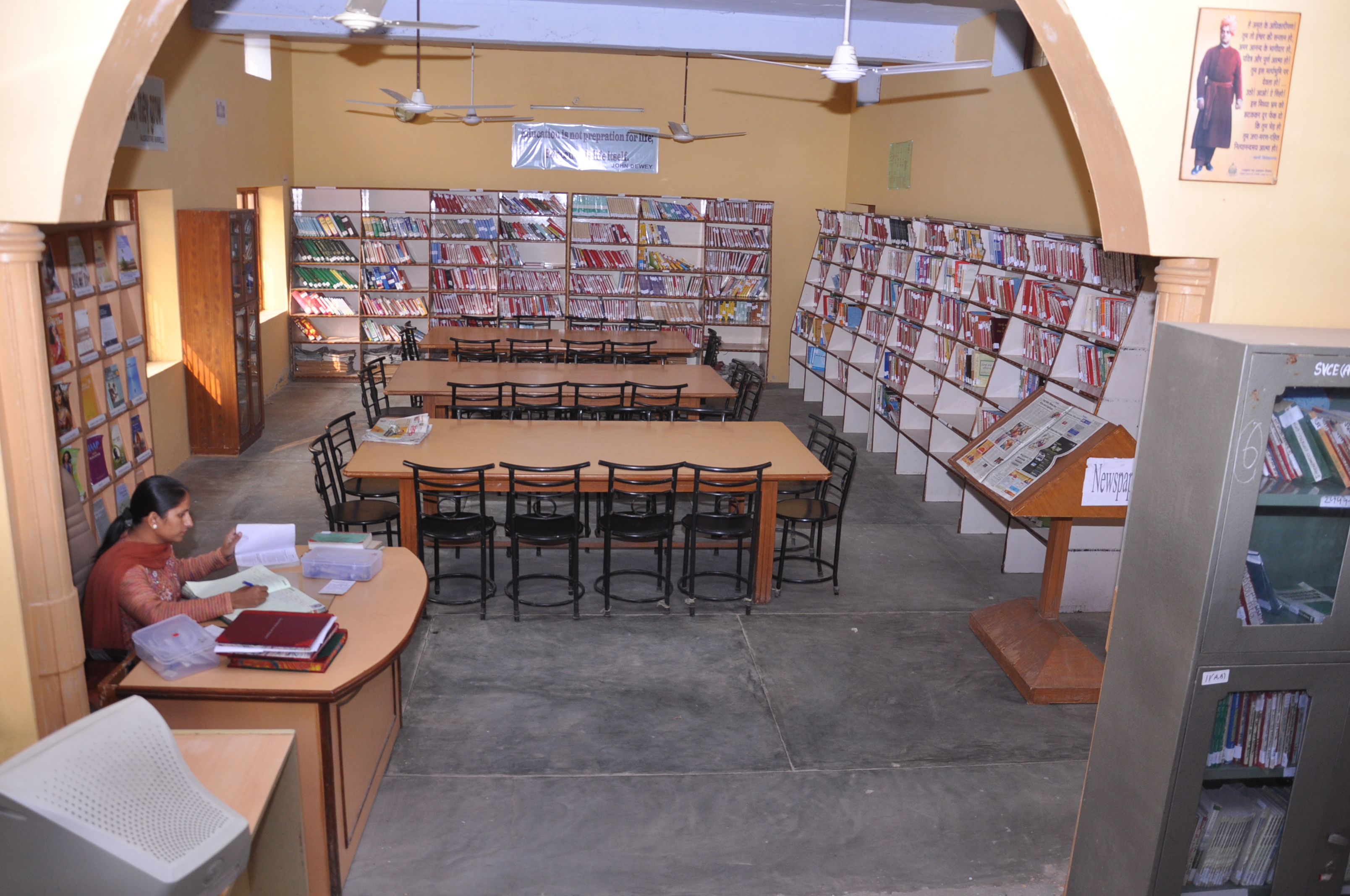 Students at the library stacks